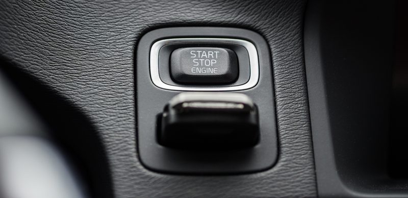 Car start stop button with inserted ignition key